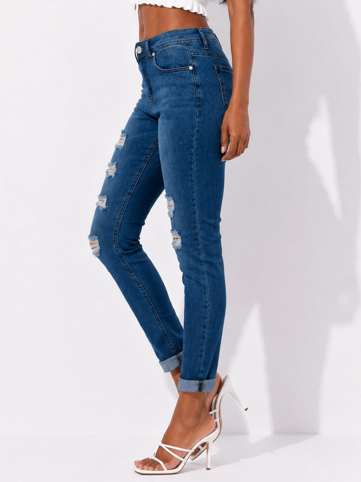 Women's Distressed Skinny Jeans with Rolled Cuffs - Label Shopper